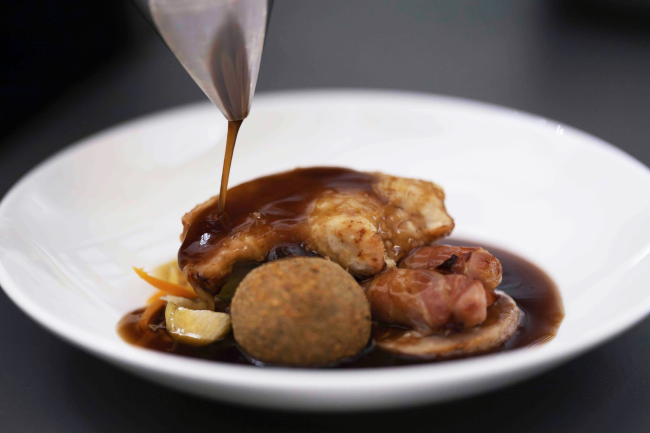 Main meal being plated up by 1599